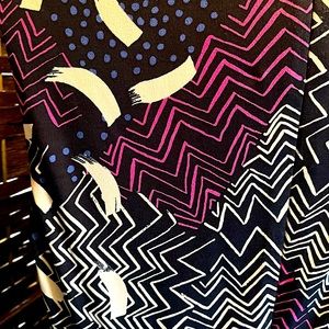 This size small business dress brings a splash of fun to any work day!